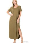 Tall woman with ponytail wearing Dusty Olivel colored Maxi dress with slit down side from knee to ankles