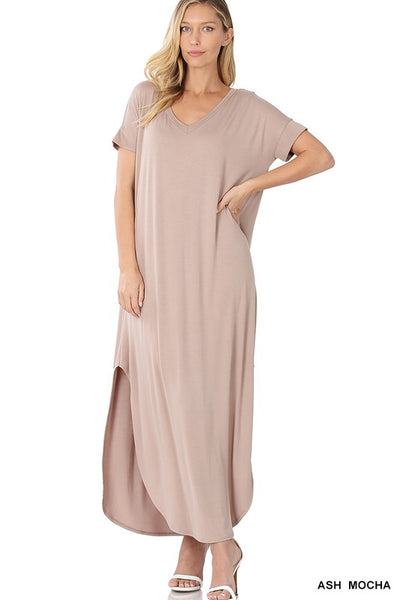 Tall woman with ponytail wearing Ash Mocha colored Maxi dress with slit down side from knee to ankles