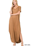 Tall woman with ponytail wearing Deep Camel colored Maxi dress with slit down side from knee to ankles