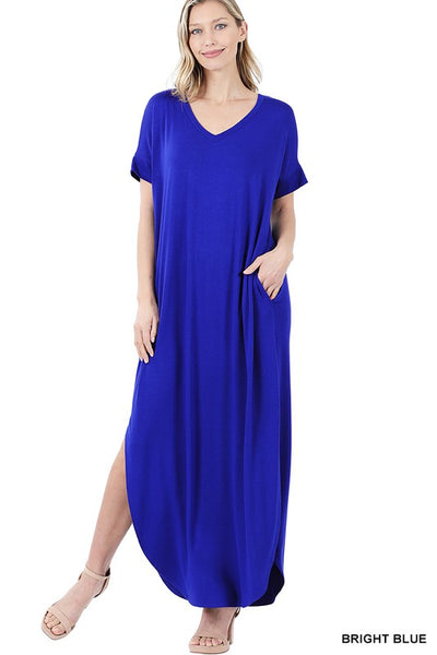 Tall woman with ponytail wearing Bright Royal Blue Maxi dress with slit down side from knee to ankles