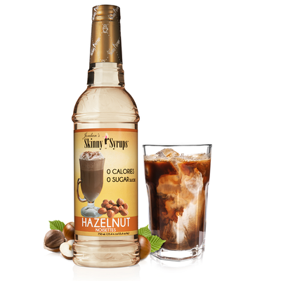 An image of a bottle of Hazelnut syrup, featuring a classic label design that represents the rich and nutty essence of hazelnuts, perfect for adding flavor to your beverages.